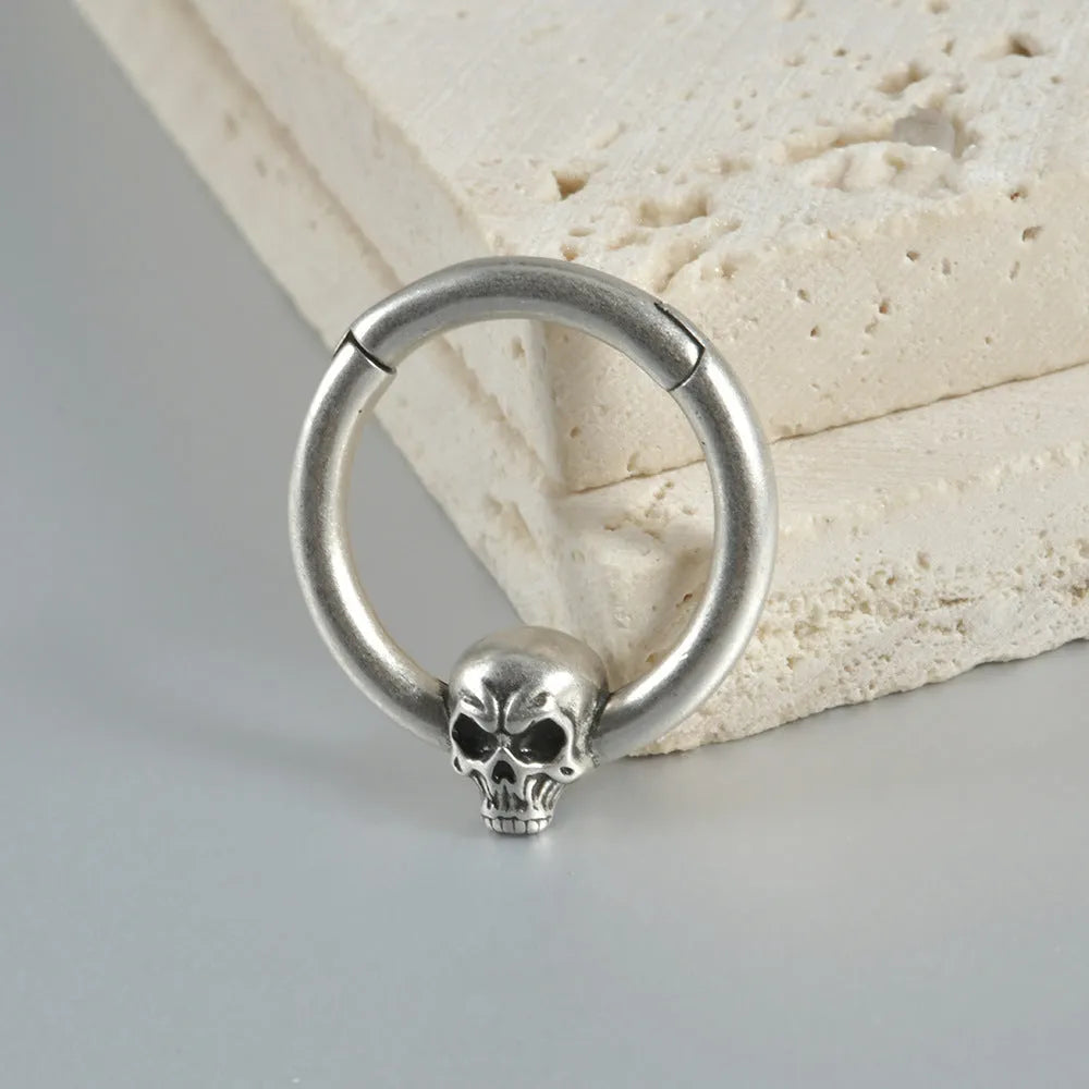 Copper punk earrings with vintage ghost head designs in antique silver or ancient gold finish