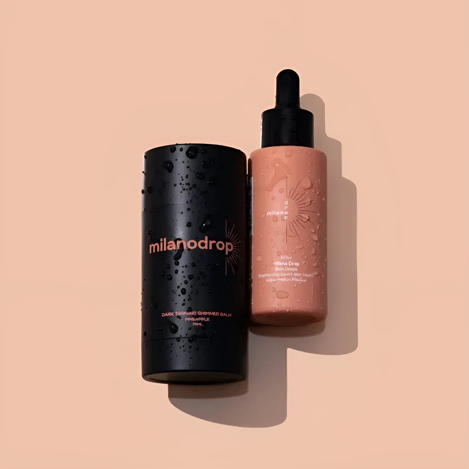 Matte sun tanning black liquid product duo showing 50ml tanning drops bottle and 75ml tanning flash cream tube