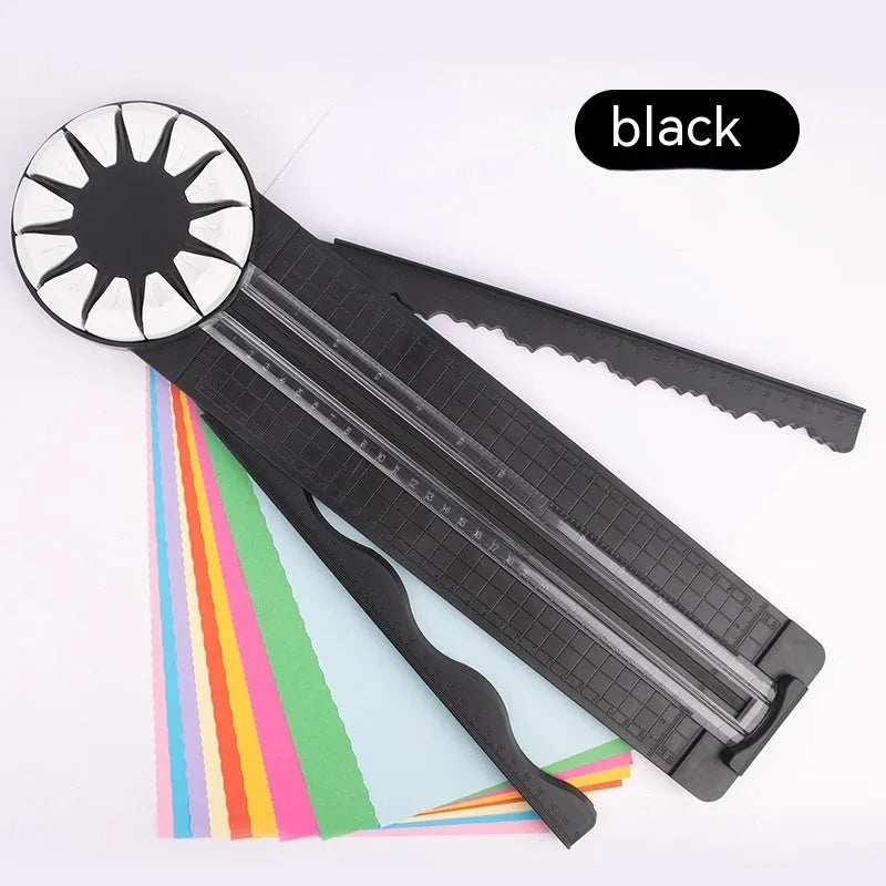 Plastic paper cutting machine with 12 patterns in pink colour on craft table
