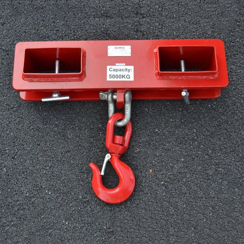 MK forklift hook attachment with rotatable hook and safety lock mounted on forklift forks.