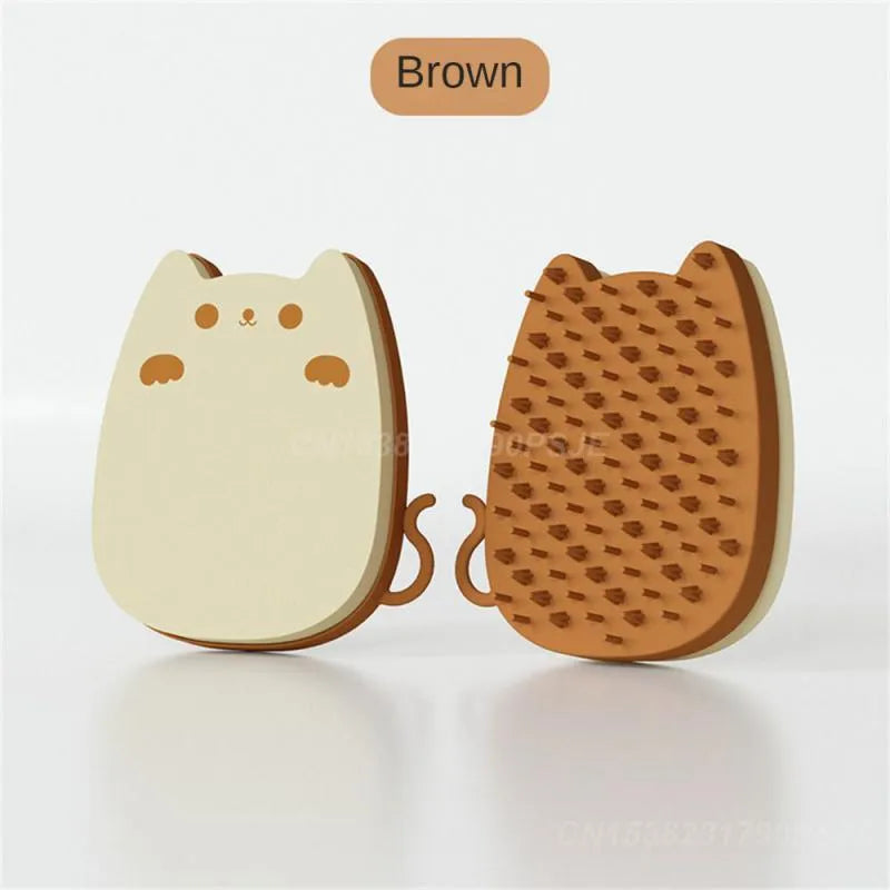Blue silicone sponge pet grooming brush with two types of comb teeth on a white background.