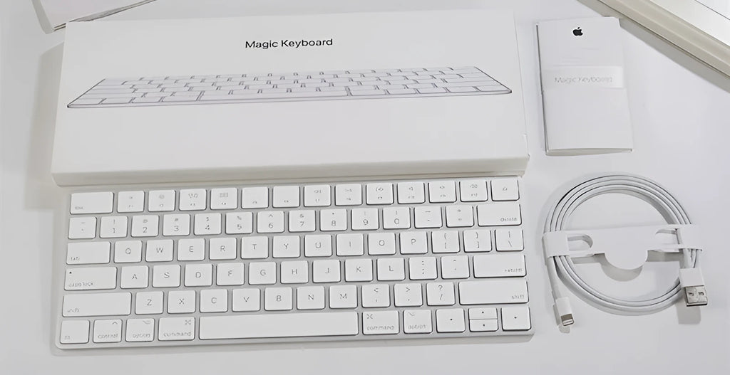 Apple white metal Bluetooth wireless keyboard with ultra-thin design and multimedia keys