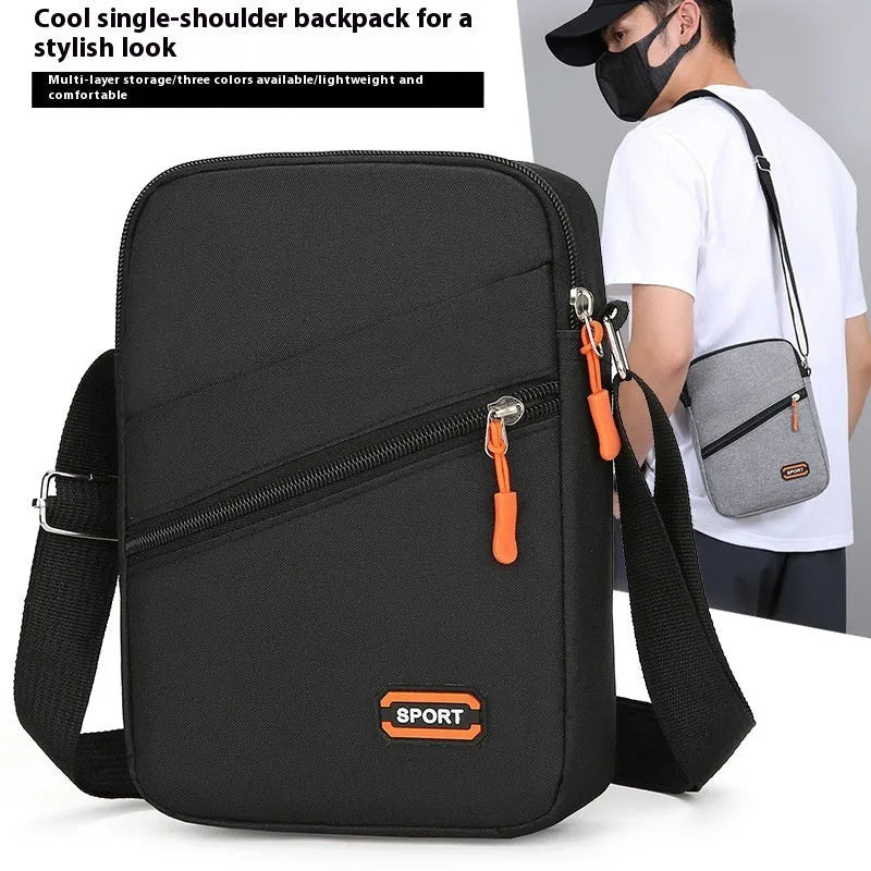 Oxford cloth commuter bag in black, navy blue, or silver grey with contrasting details