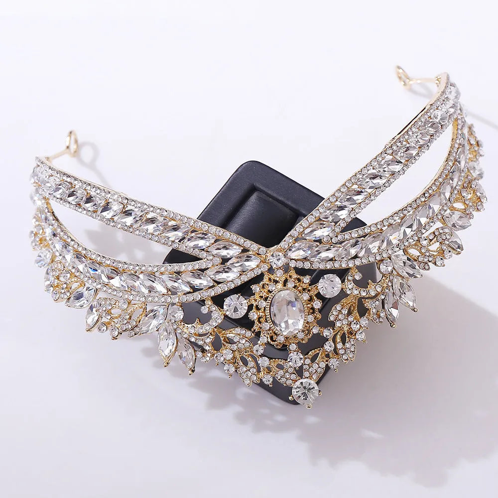 Wedding crown headdress with rhinestone and crystal in silver white finish on display