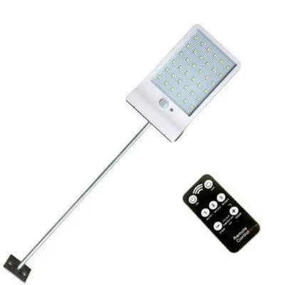 Outdoor solar garden light with LED illumination and waterproof IP65 rating in black or white finish