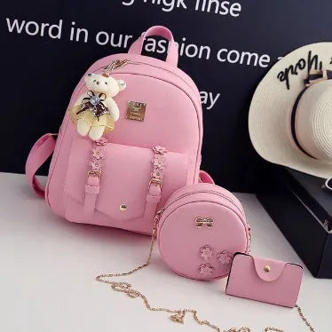 Women's fashion 3-piece bag set including backpack, shoulder bag, and card bag in floral PU leather design