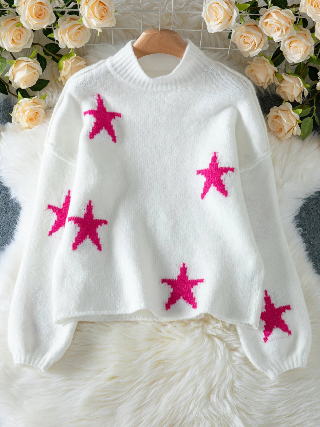 White women's loose turtleneck pullover sweater with five-pointed star pattern