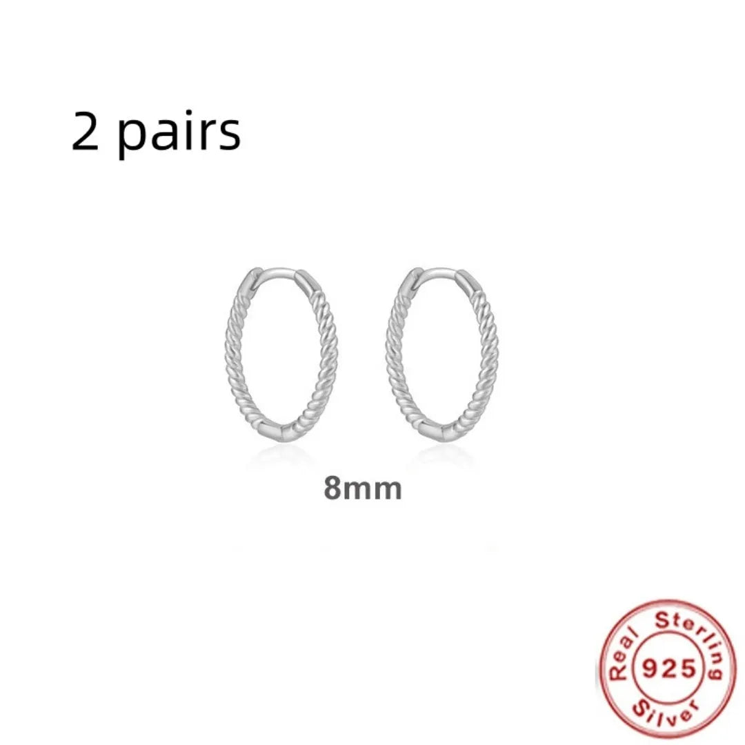 Sterling silver twisted hipster earrings in geometric round design with gold or platinum plating