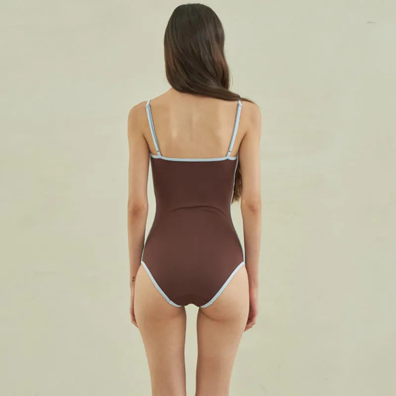 Brown triangle one-piece swimsuit for women with sexy pattern design