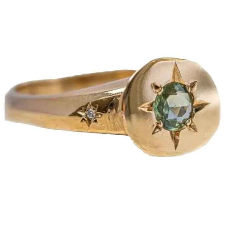 Golden adjustable ring with star design and oval asterism zircon pattern
