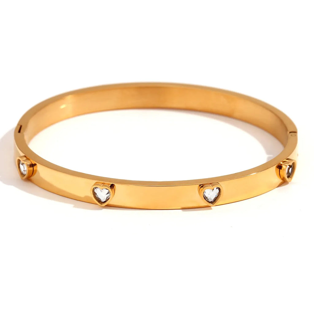 Stainless steel women's bracelet with micro-inlaid peach heart charm in electroplated finish