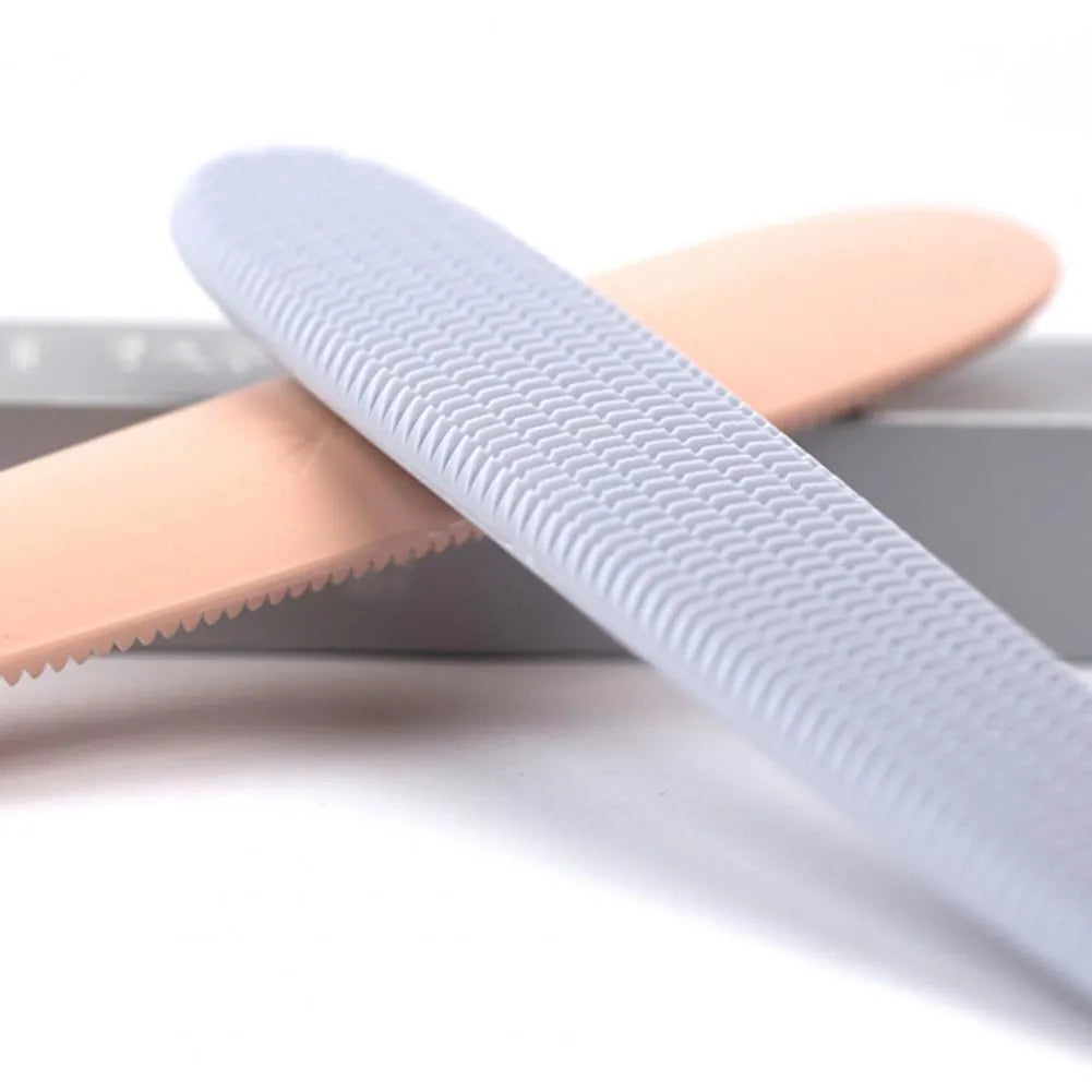 Grey and pink ABS plastic cat grooming comb with tongue-mimicking massage design
