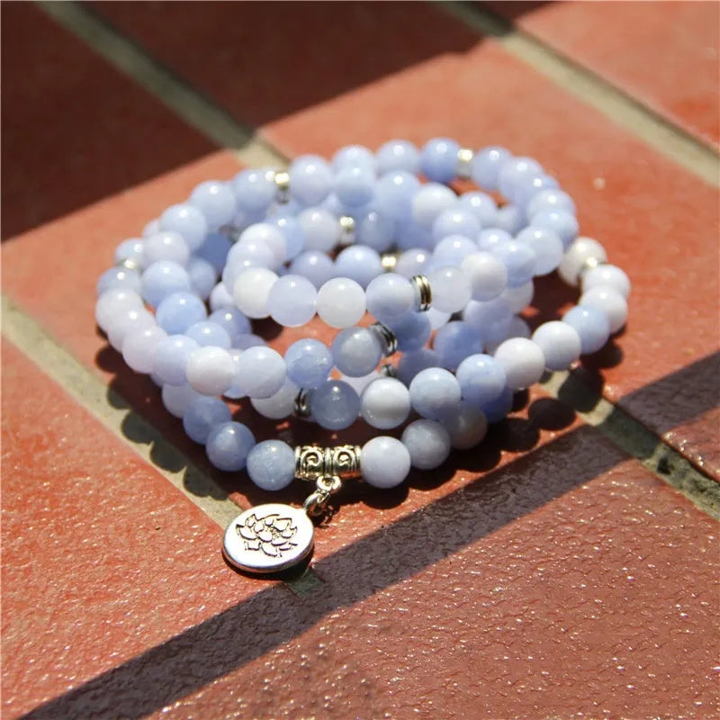 Vintage women's natural stone bracelet with geometric lotus pendant charm.
