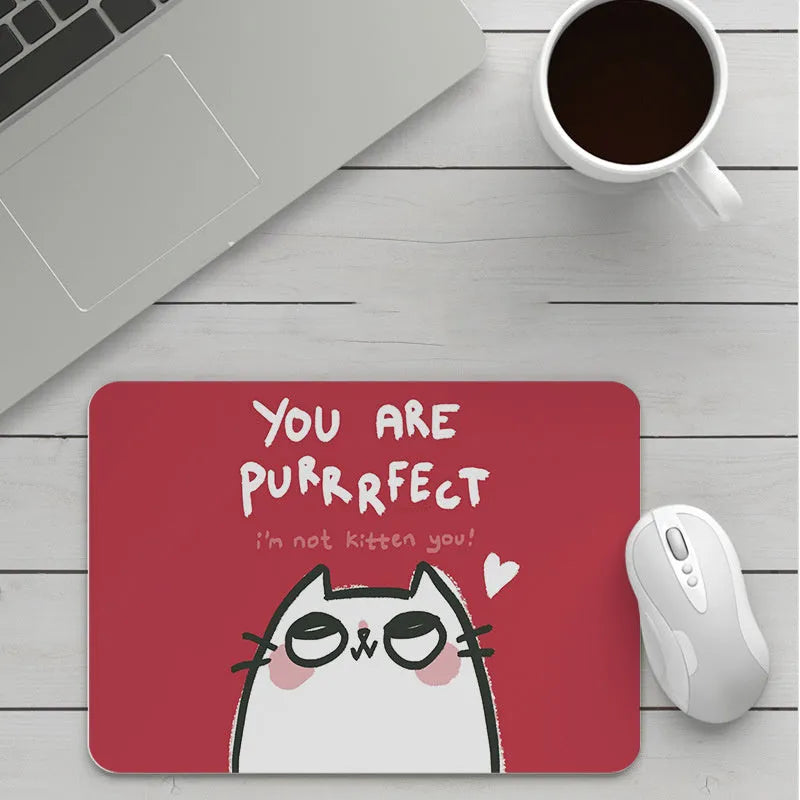 Custom cartoon mouse pad with thickening, showing example artwork on non-slip rubber and cloth base.