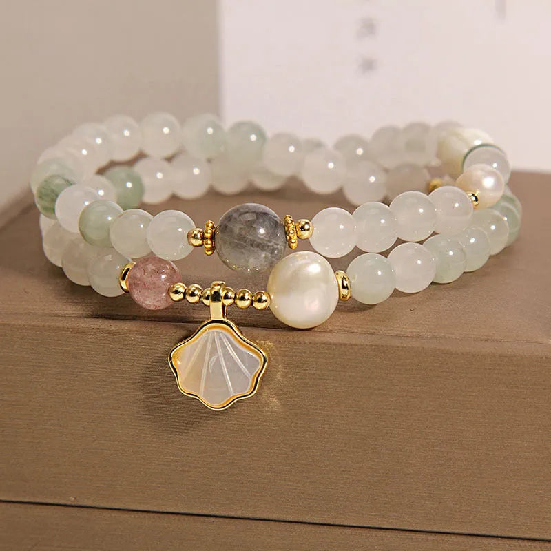 Tianshan emerald green crystal bracelet with gold-plated apricot leaf pendant and rhinestone details