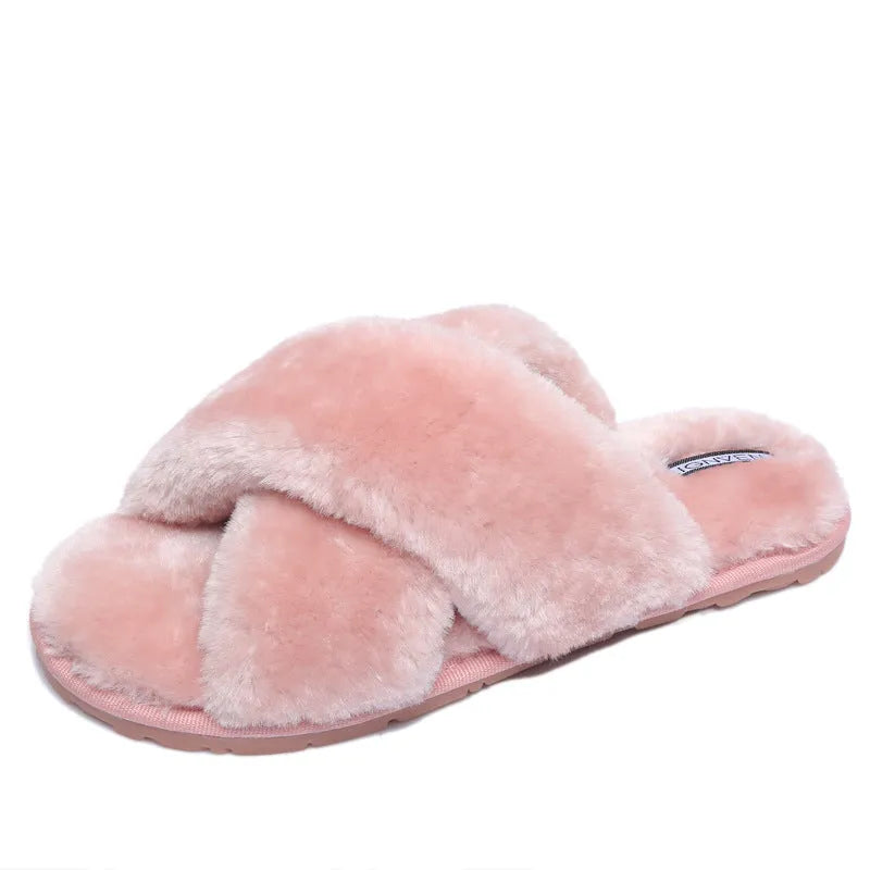 Cross open-toe fur slippers in multiple colours on a patterned non-slip sole.