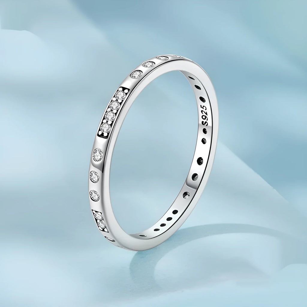 Silver alloy ring with oxidised black finish showing Moss Password I Love You design detail on band.