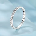 Silver alloy ring with oxidised black finish showing Moss Password I Love You design detail on band.