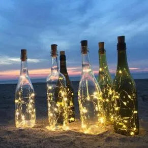 Wine bottle LED string lights with copper wire and bottle stopper for decorative illumination