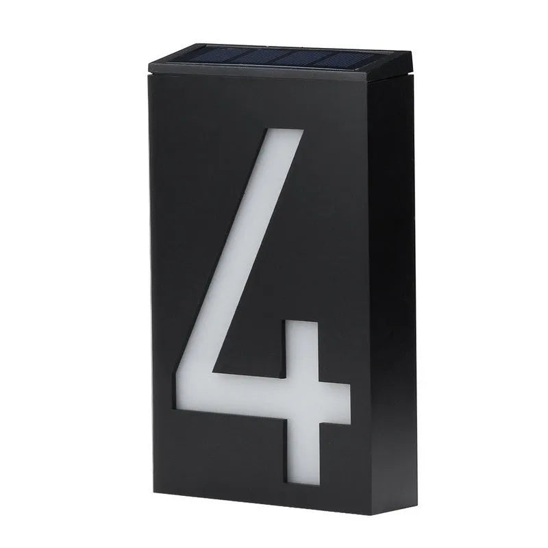 Solar powered house number light with white LEDs illuminating digit, IP65 waterproof outdoor design