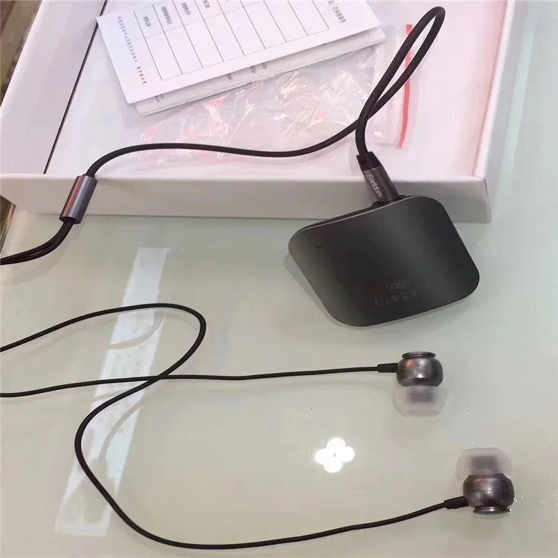 Black Bluetooth audio receiver headset with lavalier microphone for wireless calls and music