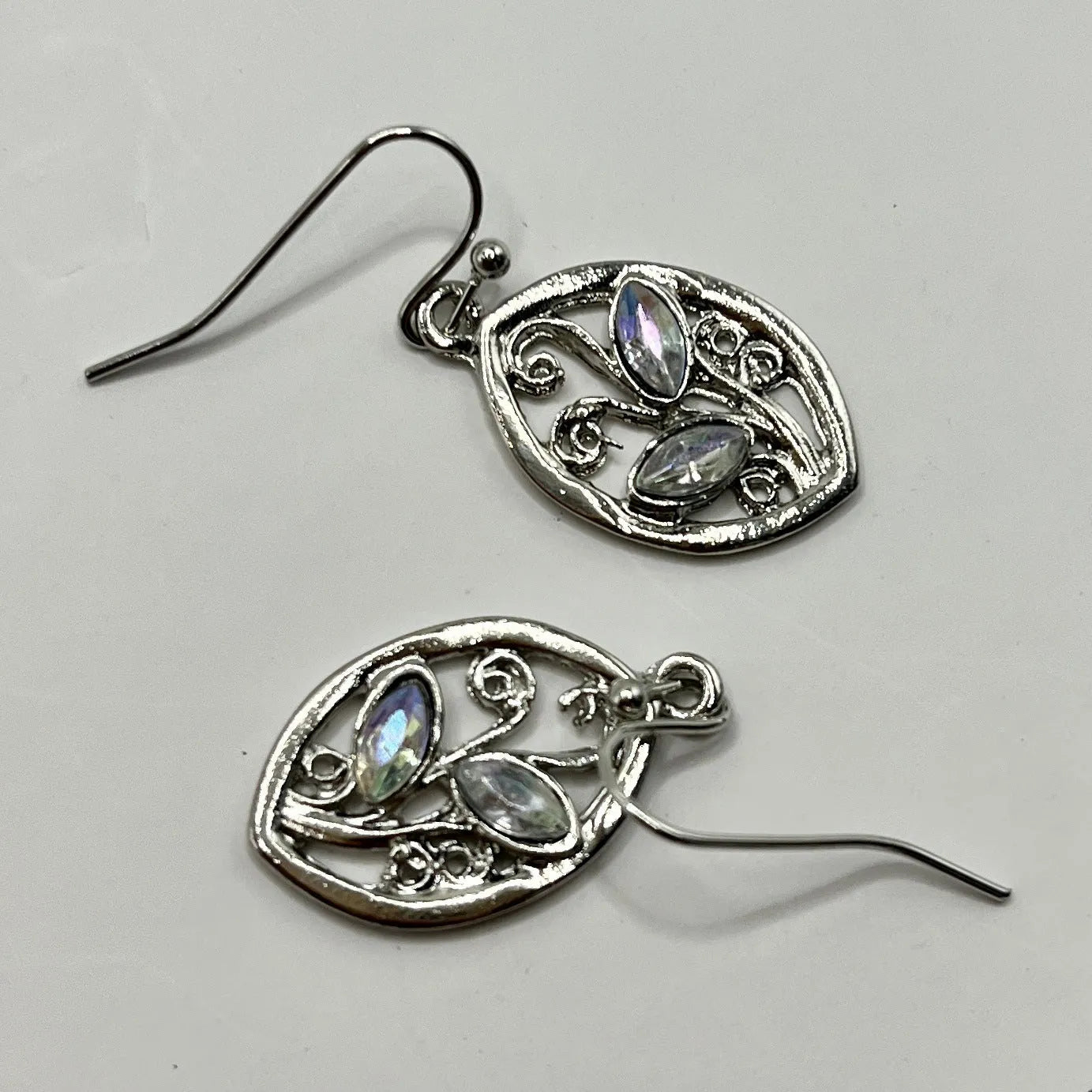 Silver-toned leaf-shaped earrings with embedded colourful moonstones for women