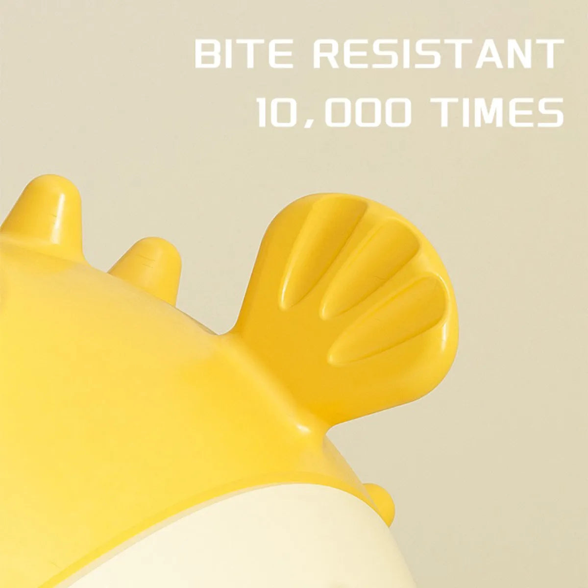 Yellow fish-shaped dog chew toy with textured surface for teeth cleaning
