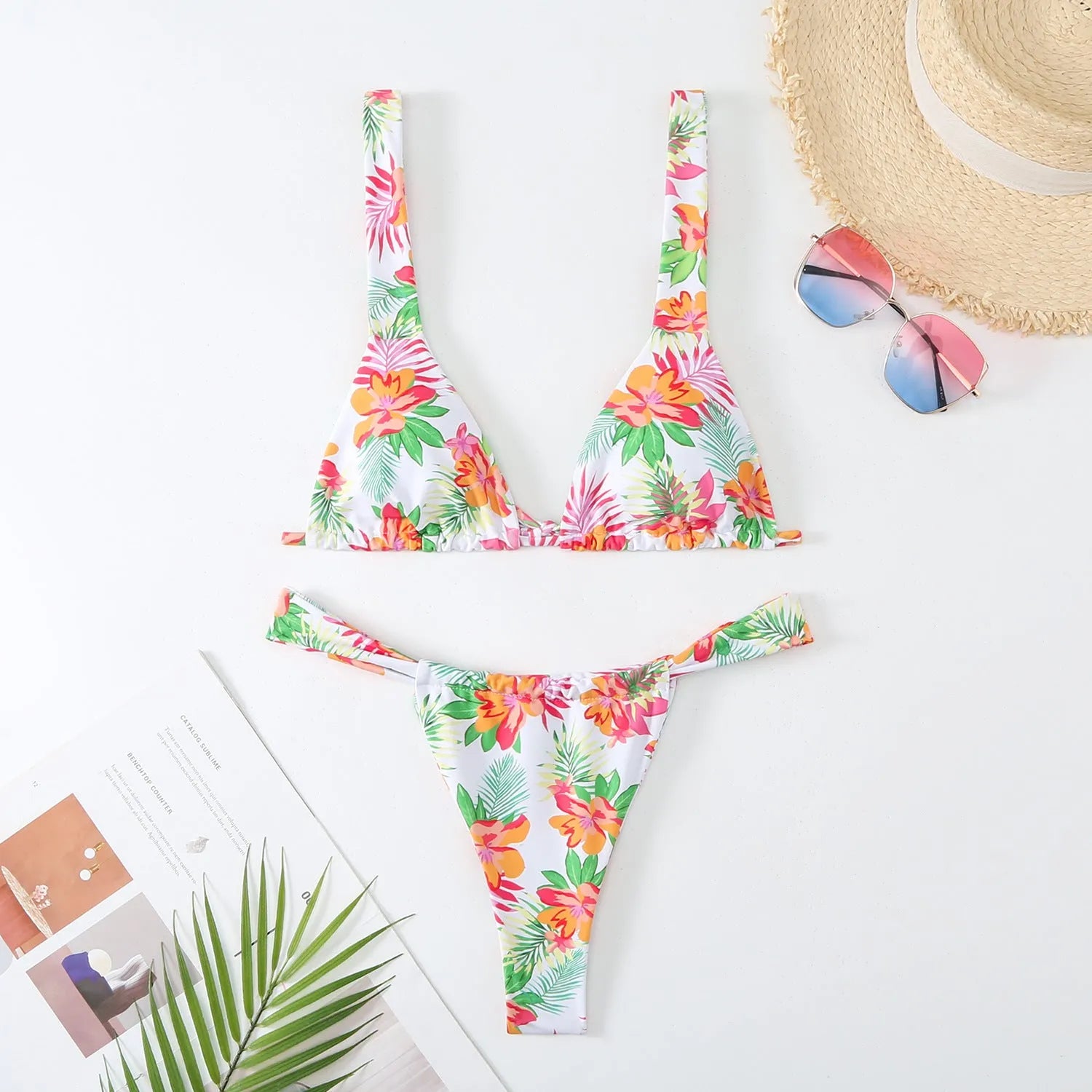 Women's floral print bikini swimsuit in blue colour with bra and panties set