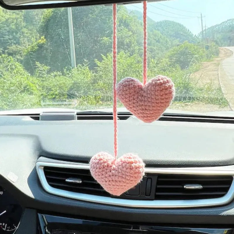 Green and white knitted rope car plant ornament with 8cm base and hanging rope.