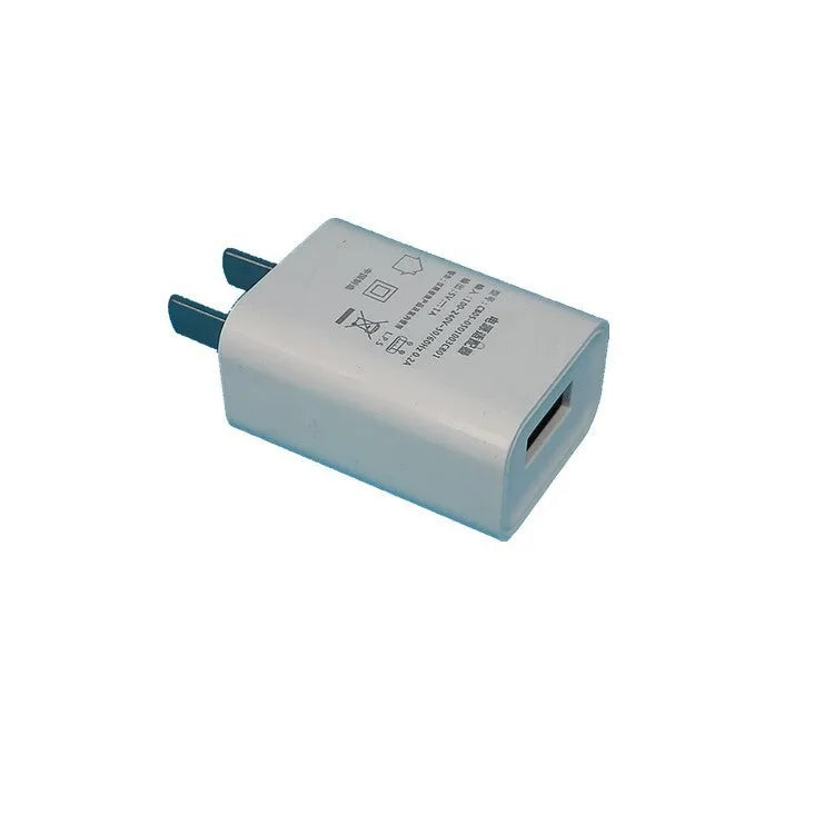 White 5V 1A USB wall charger with CE and FCC certification marks.