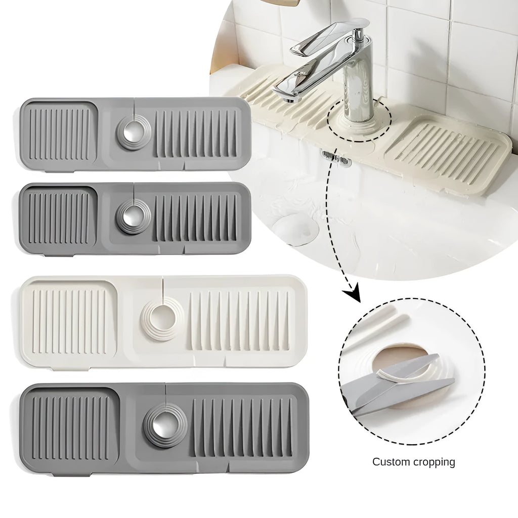Silicone faucet splash guard pad in sloped design with drain channels on kitchen sink