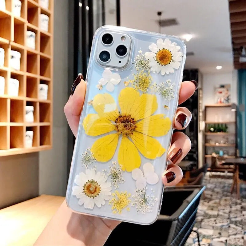 iPhone phone case with a large pink floral design on a flexible TPU back cover.