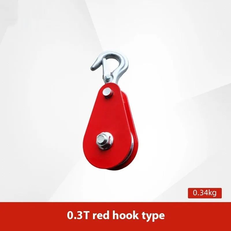 Red forged steel industrial lifting pulley with a safety latch on the hook