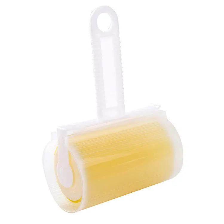 Washable reusable lint roller for pet hair removal in blue, green, pink, or yellow with cover.