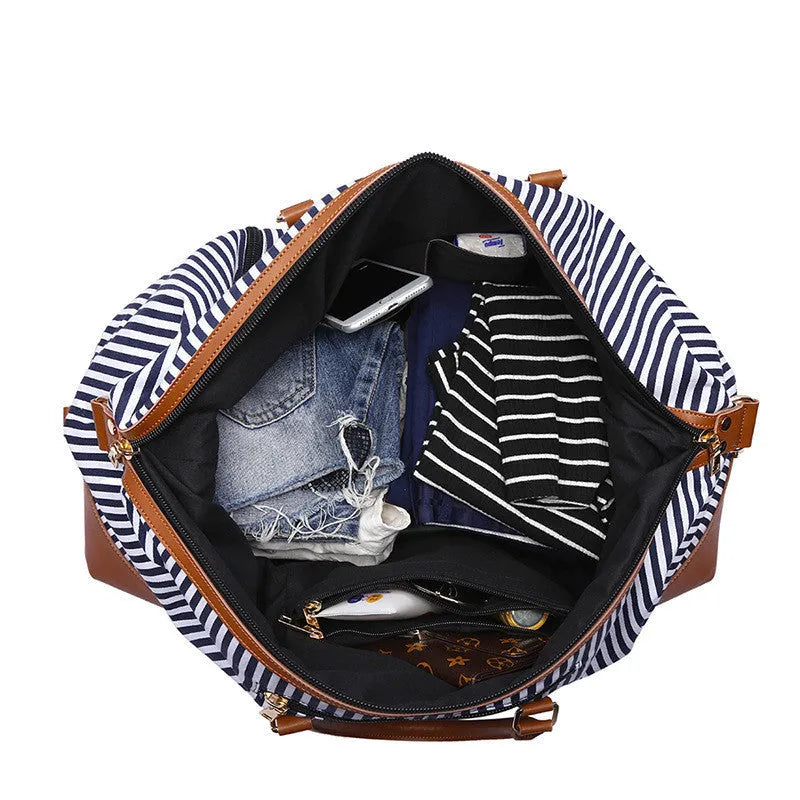 Canvas striped messenger travel bag in blue stripes, large 36-55L capacity, with shoulder strap and pull rod attachment