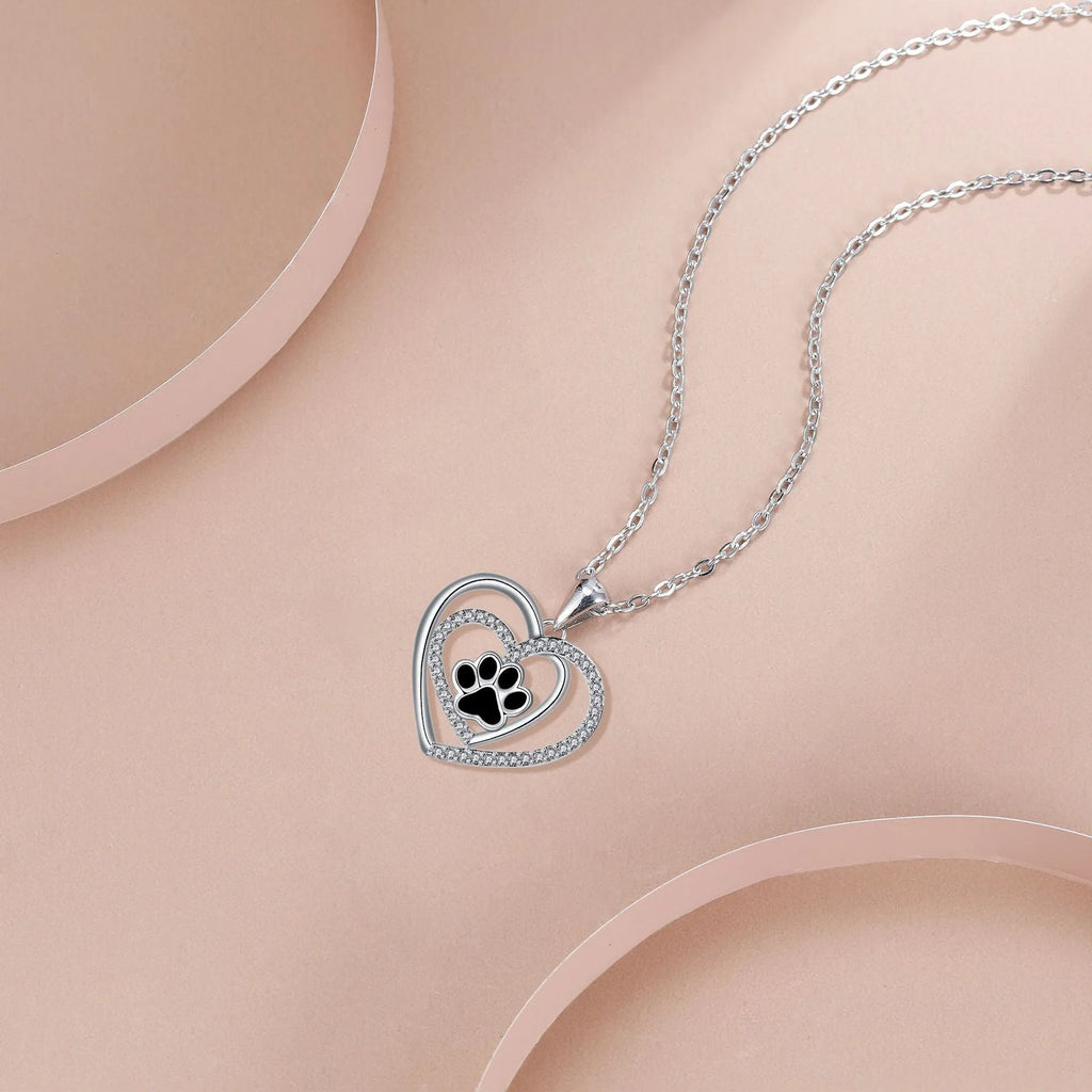 Copper necklace with heart-shaped dog paw pendant on cross chain, electroplated finish