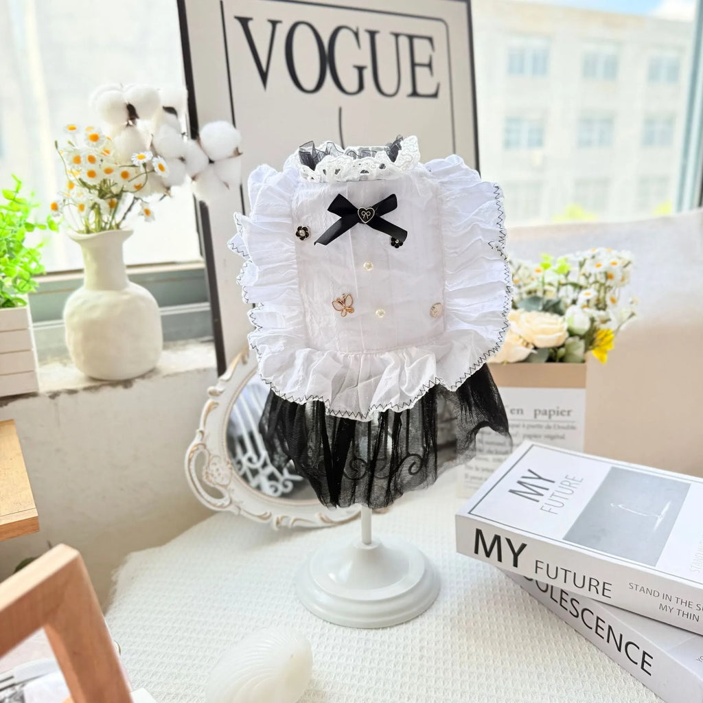 White polyester waltz gauze skirt costume on a small dog, showing princess style and lightweight fabric.
