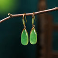 Retro Chinese-style geometric earrings with jade green electroplated finish and water droplet design on copper base