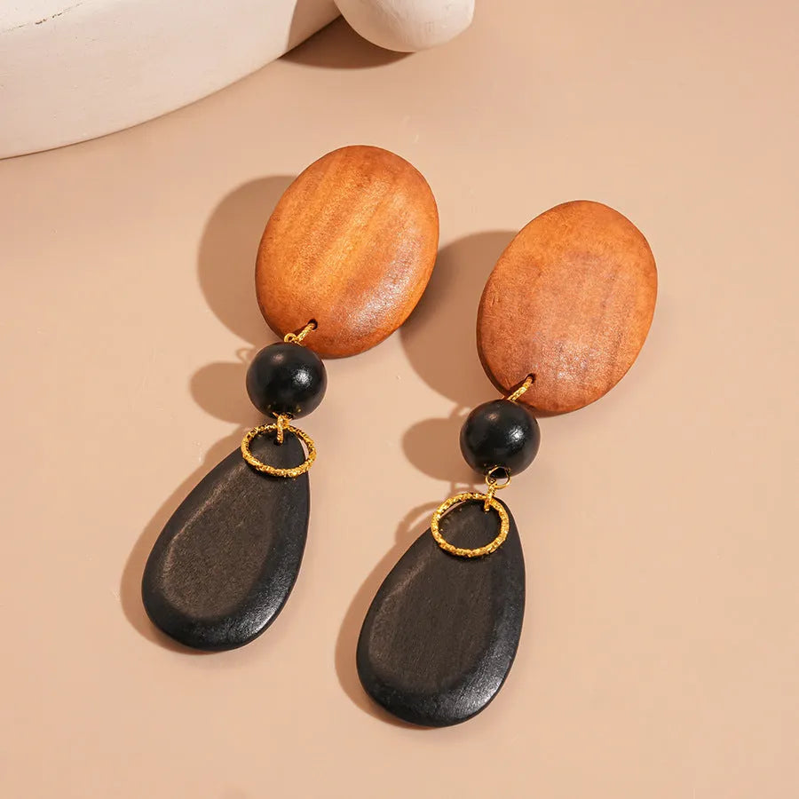Retro wooden ellipse earrings in silver needle brown-black colour with manual craftsmanship