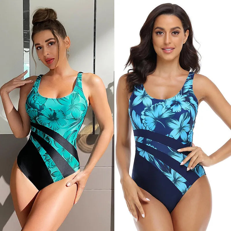 Blue and green printed conservative one-piece swimsuit for women on a mannequin.
