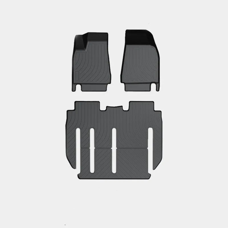 Rubber floor mat set for Tesla Model X showing foot pads and tailbox cushion for interior protection