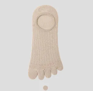 Modal five-finger boat socks in black, shown on a foot with invisible no-show style.