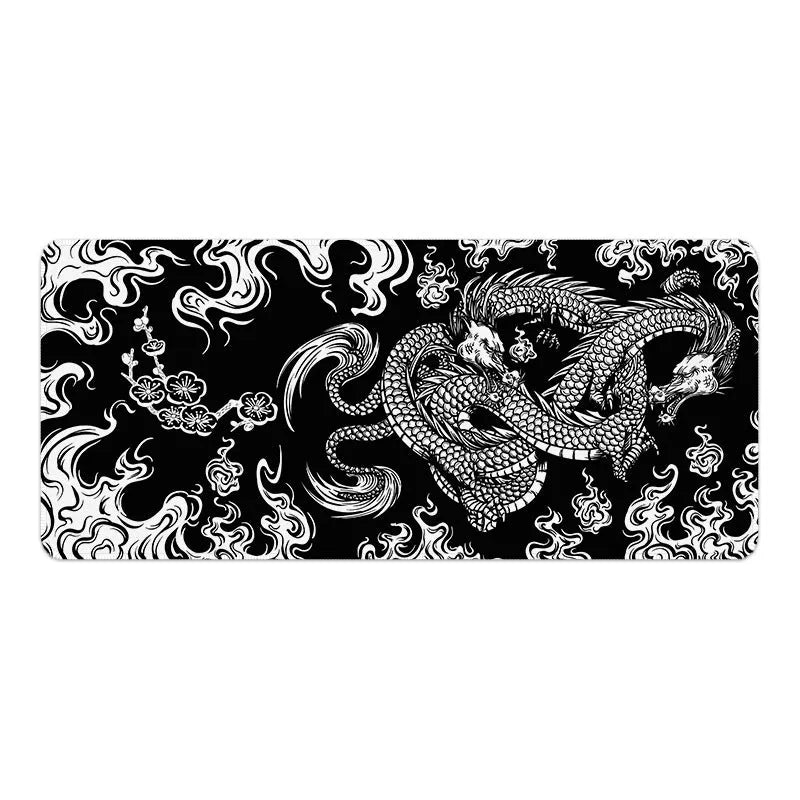 Dragon pattern cloth mouse pad with anti-slip backing showing three artwork variations on desk