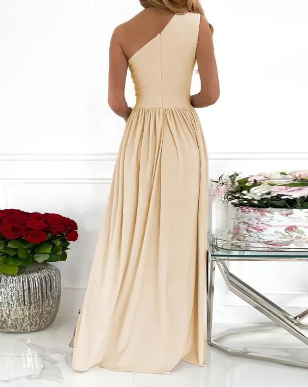 Women's apricot one-shoulder maxi dress with high leg split and sleeveless design.