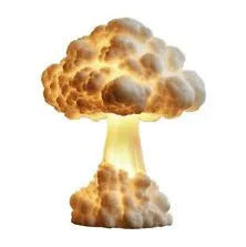 Mushroom cloud shaped atomic explosion table lamp with USB power cable on a desk.