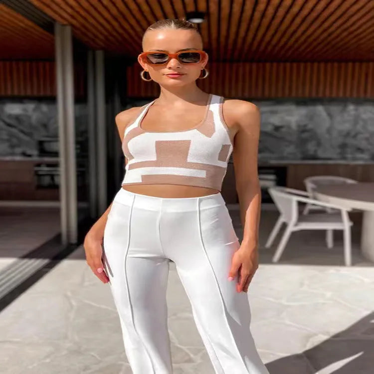 Women's slim fit U-collar camisole vest in contrast colours on a model.
