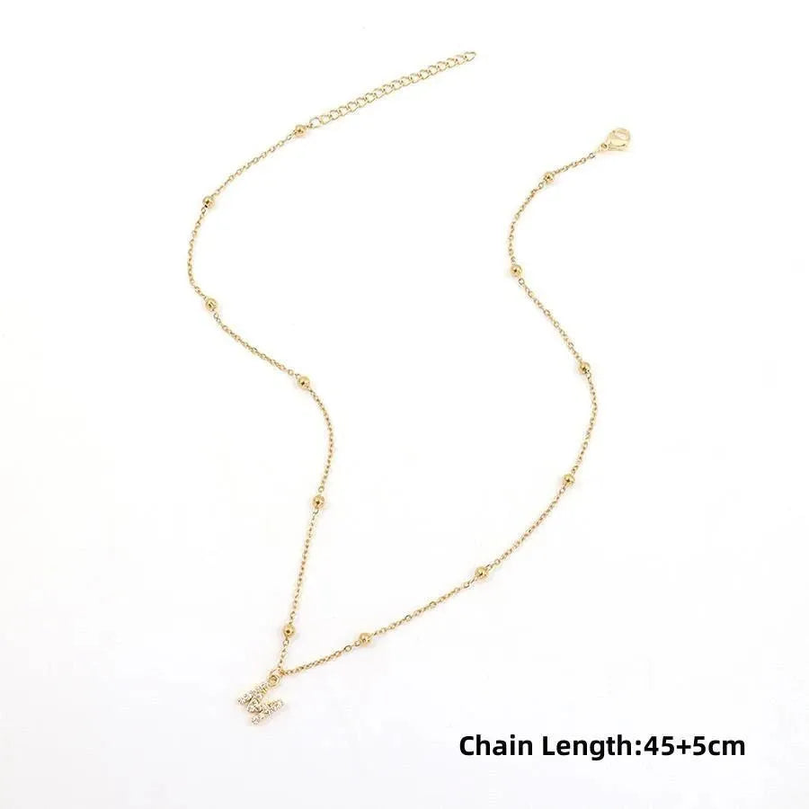 Light luxury copper letter pendant necklace with micro zircon inlay on O-ring chain