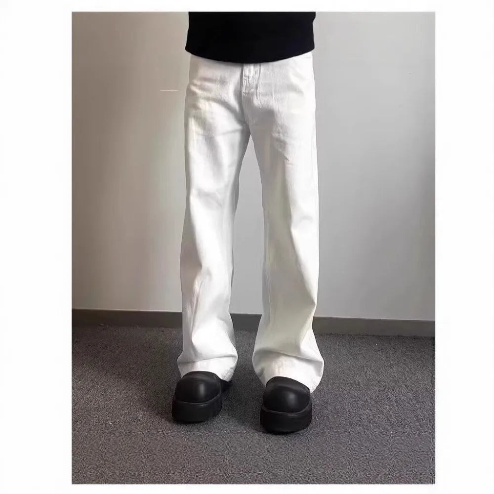 Men's white straight leg jeans with loose fit and mid waist design
