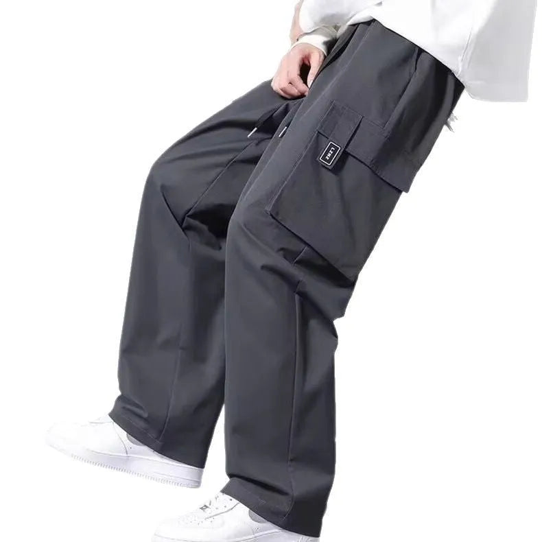 Boys' straight-leg cargo pants with large pockets and drawstring waist in army green colour