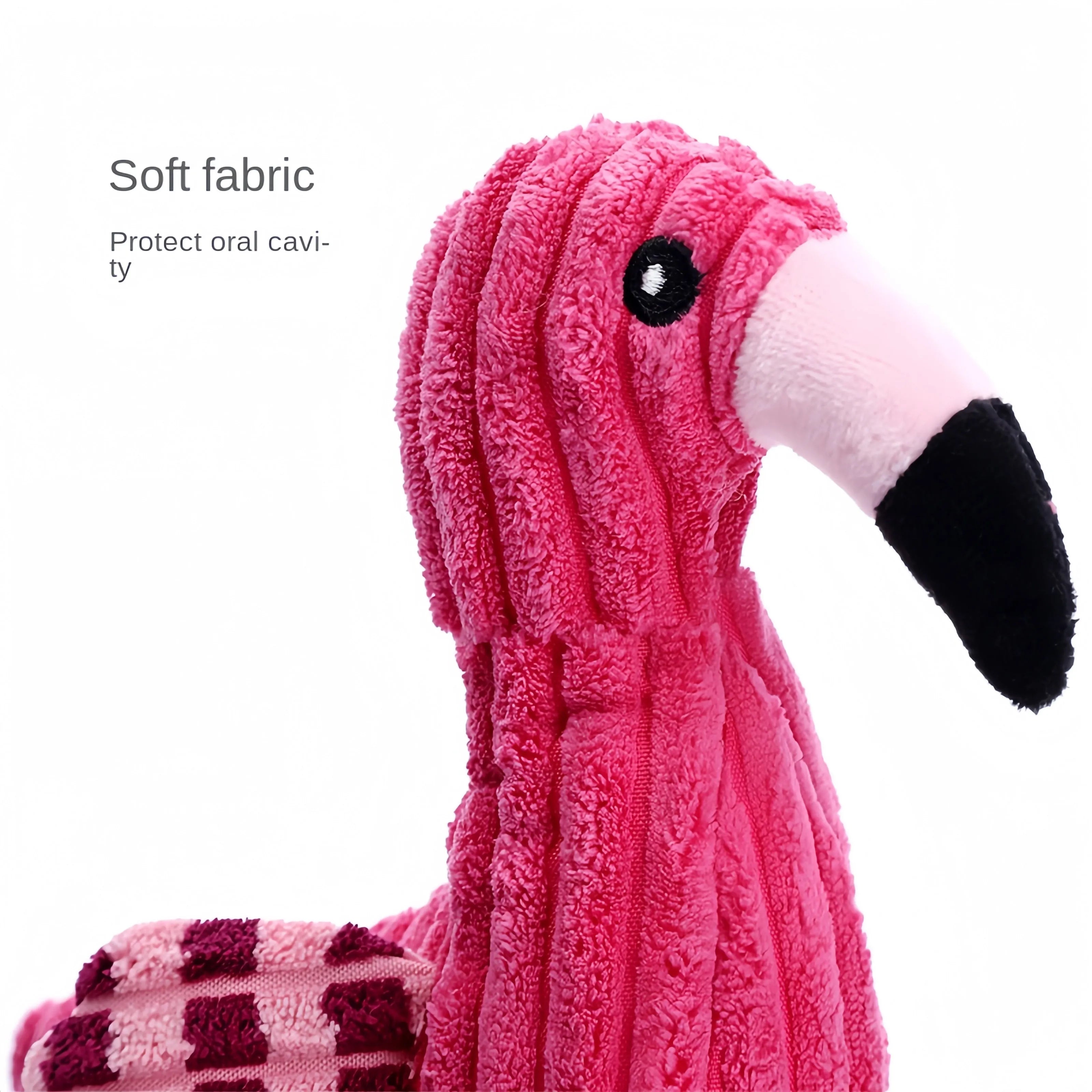 Pink animal-shaped corduroy plush dog toy with a squeaker inside